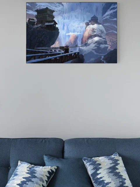 Cold fantasy settlement built into mountain cliffs