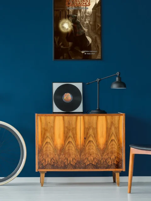 Fantasy mage casting glowing spell in stone city