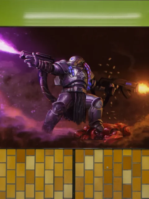 Futuristic ORWAR combat figure amid smoke and fire