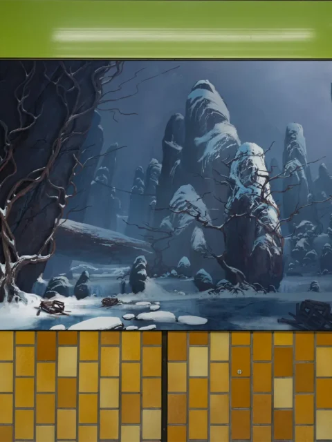 Wide view of Shivershriek Canyon frozen spires artwork and water