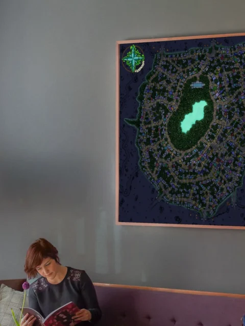 Illustrated city map at night with lights