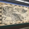 Fantasy world map illustrated on parchment-style canvas