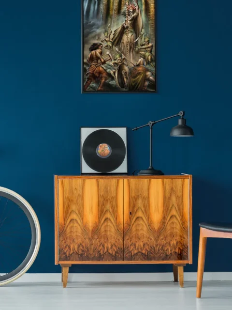 Undead sorceress commanding warriors in a temple