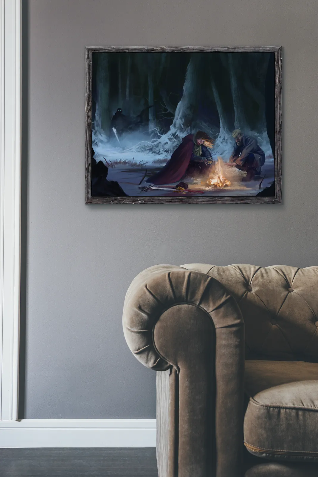 Two travelers crouched beside a small winter fire