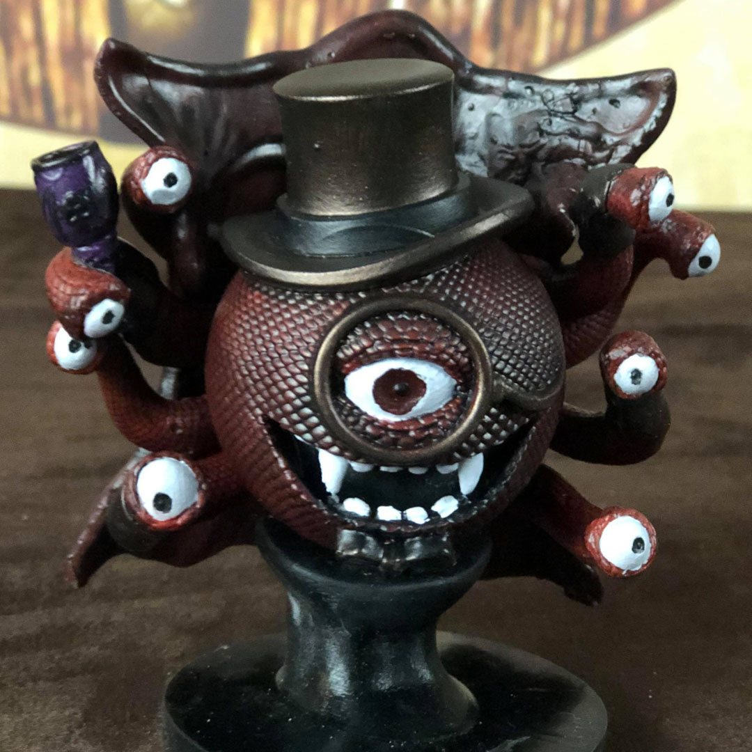 Three-quarter angle showing dramatic cape spread and stance