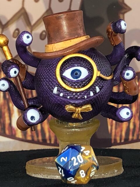 Mr. Dandy front view displaying ornate hat and central lens detail