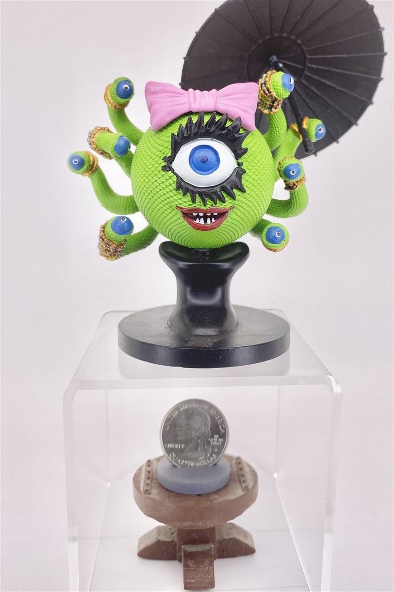 Front view of Margot the Destroyer holding extended parasol