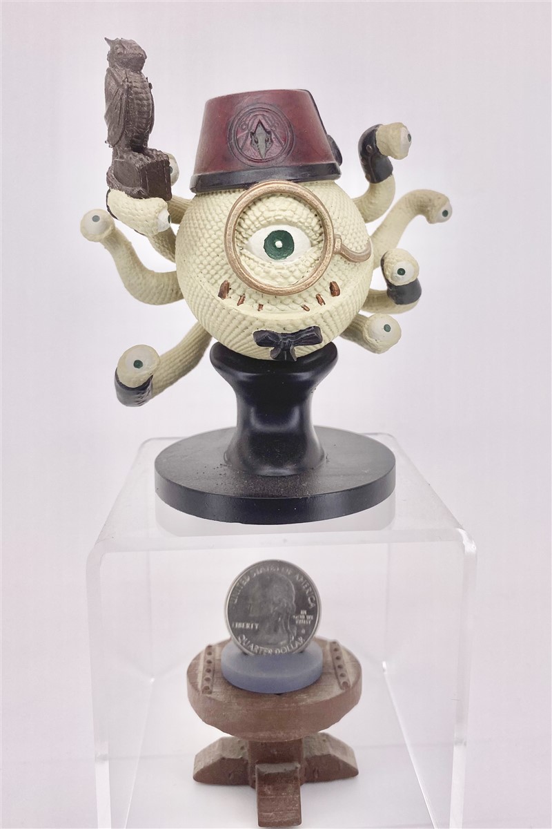Front view of Professor Orlac with academic hat and instrument details