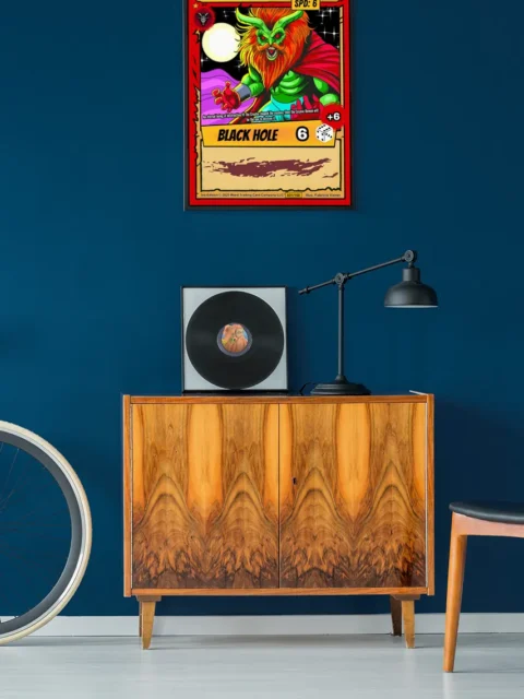 Flowing red-orange mane and crimson cape against black starfield with white moon.