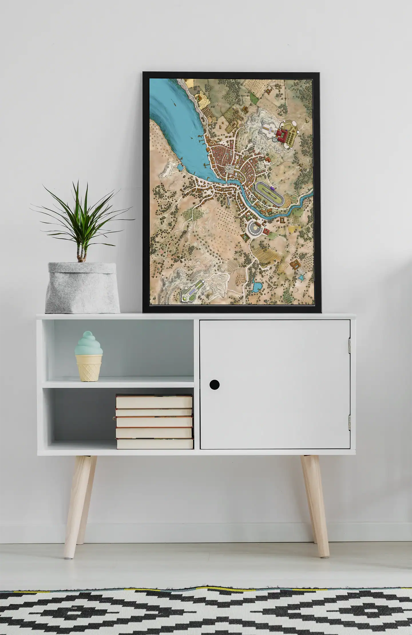 Hand-drawn fantasy map showing coastal settlement split by bright turquoise river.