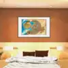 Spiral-shaped coastal city built on golden sand with concentric rings of buildings.