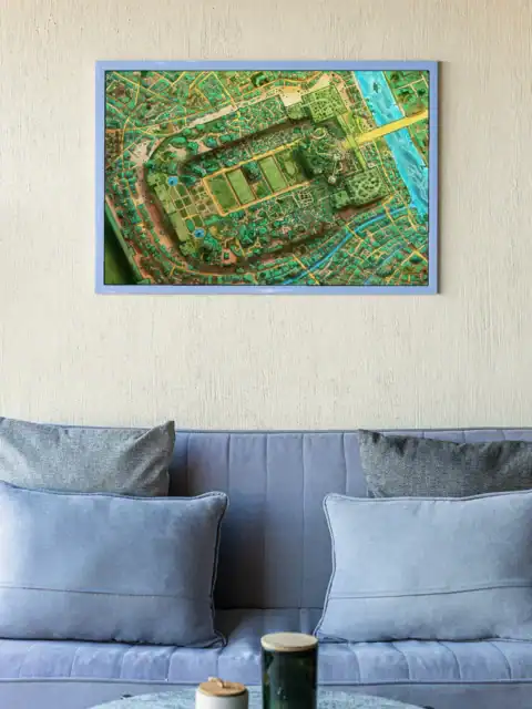 Brown cliff faces and elevated terrain creating natural city boundaries.