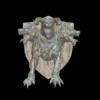 Front view of the cerberus trophy bust with three snarling heads on a studded wooden shield